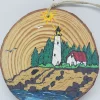 Lighthouse On Coast With Mountains Wood Ornament